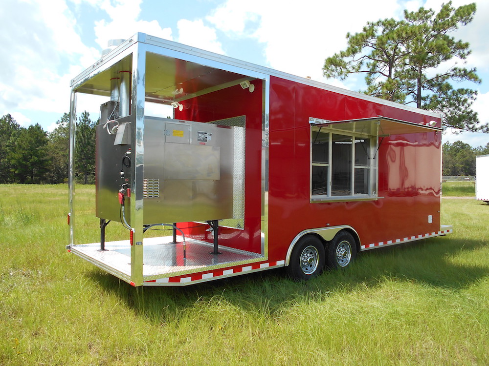 A red trailer with a large open door.